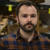 Daniel Clark standing inside a wood shop