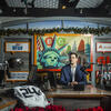 Zach Gelb sitting at his desk in the studio