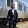 Benjamin Aitoumeziane poses by a SEPTA train.