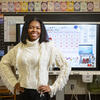 Honoree Sydney Smith smiling and standing in her school classroom
