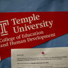 a flag in honoree Sydney Smith's classroom that reads Temple University College of Education and Human Development