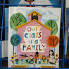 the cover of a children's book in honoree Sydney Smith's classroom. The title is Our Class is a Family.