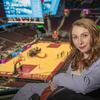 Mary Kate Meals poses for a photo in the Cleveland Cavaliers arena.